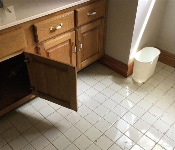 water on bathroom floor 
